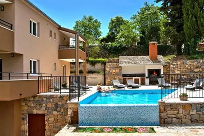 Image de Villa Mosor mit beheiztem Salzwasserpool und Sauna by Interhome