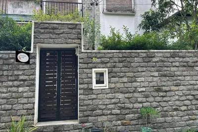 Image de Villa with natural serenity, surrounded by lush greenery and Ac comfort.