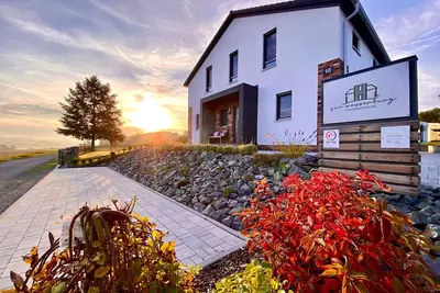 Image de Modern apartment in the heart of the Vogtland with a large garden & view of the water