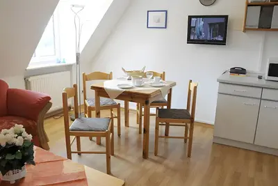 Image de Appartement 'Fewo Seegarden' avec jardin commun et Wi-Fi