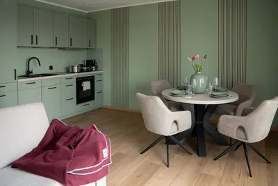 Image de Appartement neuf Salzwiese à Dangast avec terrasse privée et bureau, proche de la plage