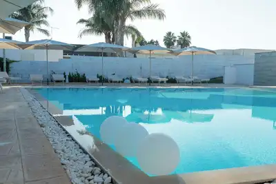 Image de Boomerang Apartments 6 – Design Experience Suite con Piscina nel Cuore di Avetrana – a 5 minuti dalle splendide Spiagge del Salento