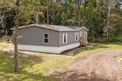 Image de Charming house close to Holden Beach in Supply with ample parking for your boat.