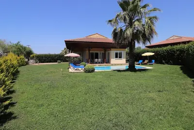 Image de Tr7 3+1, Villa has a large private garden and pool.