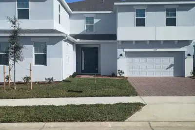 Image de Spacious New 7-bedroom house in beautiful Groveland with Ac, gym, pool and park