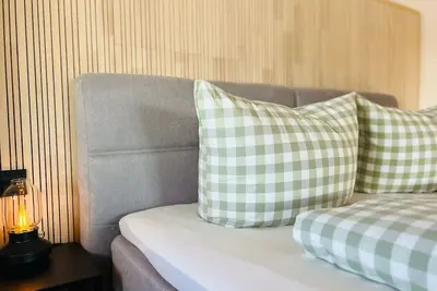 Image de Appartement 'Waldgeflüster' avec vue sur la montagne, balcon privé et Wi-Fi