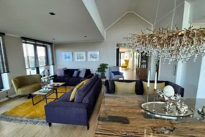 Image de Inseltörn Penthouse - 3 rooms & roof terrace, admission to the Meerzeit included.