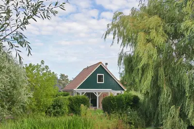 Image de Rustig gelegen in het groen, het Sluishuis