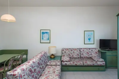 Image de P. R. Club - Appartement Enea 22 avec vue mer, terrasse privée et climatisation