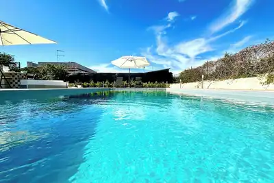 Image de Maison gratuite Une oasis avec piscine privée