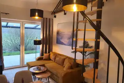 Image de Haus Kiebitz, cozy vacation home with sauna by the North Sea