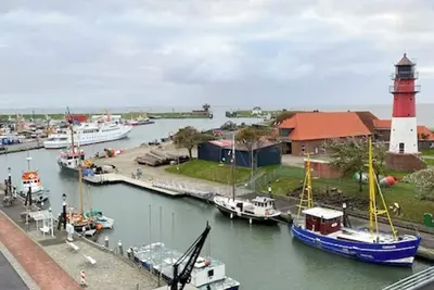 Image de Wellness with a harbor panorama: your exclusive apartment for 4 people and home away from home