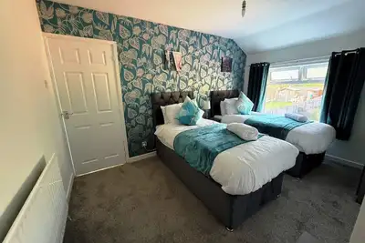 Image de Comfy 3 Bedroom House Near Cov Arena & Train Station!