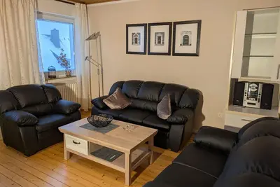 Image de Bright apartment (81sqm) with wood-burning stove and balcony with view