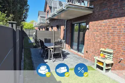 Image de Ostfriesische Herrlichkeit 1, Fantastic apartment with garden and sauna on the coast