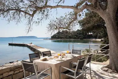 Image de Maison de vacances privée avec bain à remous, climatisation, Wifi, Tv, terrasse, animaux admis