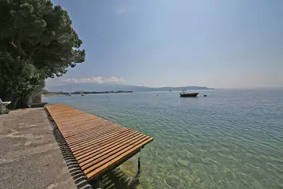 Image de Appartement moderne avec vue sur le lac & plage privée!
