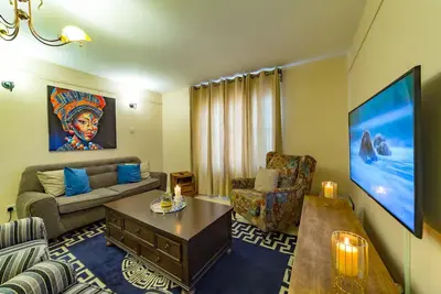 Image de Cozy parlor- ultimate retreat near the Airport, Sgr terminus & the expressway