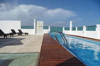 Image de Explore Cancún’s Best from 3 Modern Rooms with Rooftop Sun Deck Access