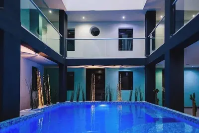 Image de Your Downtown Hub for Fun and Exploration: 4 Spacious & Relaxing Rooms in Merida