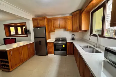 Image de 2a Enjoyable 4-bedroom apartment with Ac -Wifi in Santiago de los Caballeros