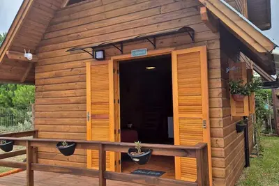 Image de Cabins in Torres, Rs, offering leisure and relaxation in a cozy and peaceful location.