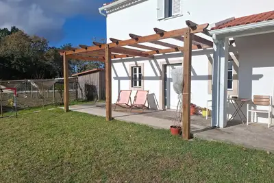 Image de Our farm, with a garden, animals and vineyards.