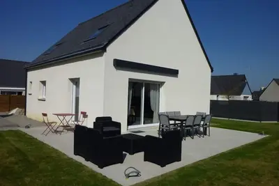 Image de Maison 8 personnes, la plage et les commerces à pieds.