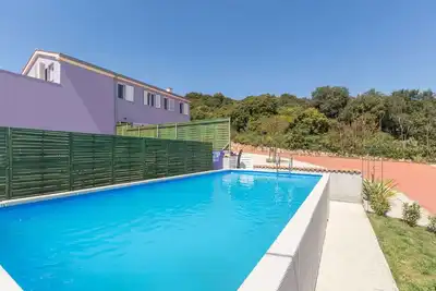 Image de Maison de vacances avec climatisation et piscine