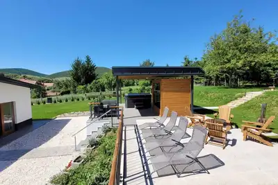 Image de Maison de vacances avec sauna, jacuzzi, climatisation et grand jardin