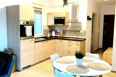 Image de Appartement de vacances Front de mer avec climatisation et Wlan