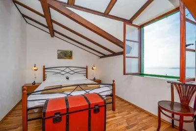 Image de Appartement de vacances avec climatisation et vue sur la mer