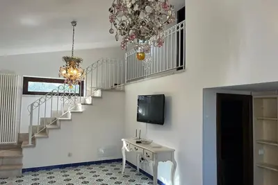 Image de Villa « La Mansarda Di Cecè » avec piscine partagée, Wi-Fi et climatisation