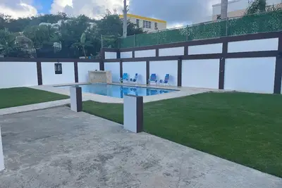 Image de Experience luxury in this stunning Luquillo 4-bedroom home with a pool and Ac.