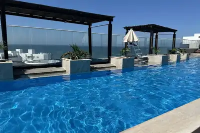 Image de Beach front apartment in SantaMarta in spectacular building with great amenities