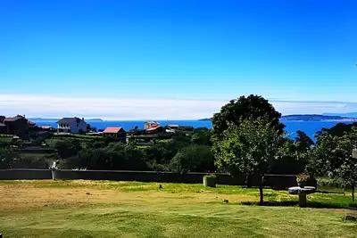 Image de Maison en pierre restaurée avec verger, hórreo et vue imprenable sur la mer