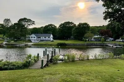 Image de Narrow River Waterfront One-Level Ranch with Dock, Stroll to River Beach