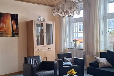 Image de A cozy vacation apartment in a charming former hotel.