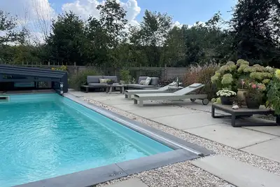 Image de Villa familiale 8 couchages /piscine chauffée/ chiens admis / 10' de Pairi Daiza