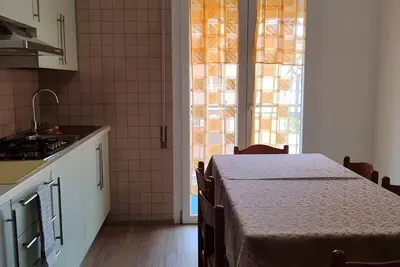 Image de Appartement 'Villa Trentina Trilocale 2e étage' avec terrasse partagée et Wi-Fi