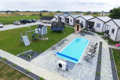 Image de Maisons de vacances avec piscine, jacuzzi et sauna