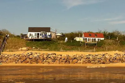 Magnificent Sunset overlooking  Cape Cod Bay beautiful sandy beach direct access