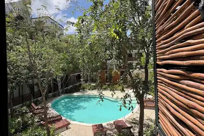 Image de New Beautiful apartment with pool view + 2 bicycles.