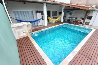 Image de Relaxation and home office with a pool in Itanhaém