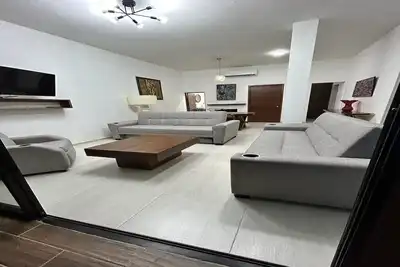 Image de Spacious apartment for 8 in Zona Americana, All Nearby.