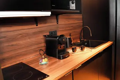 Image de Batroom • Suite Batman • Balnéo & Salle Cinéma