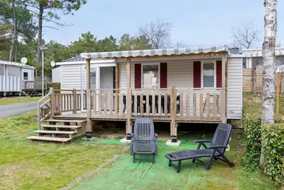 Image de Mobil-home à Saint-Jean-de-Monts avec piscines chauffées, terrasse privée et jardin commun