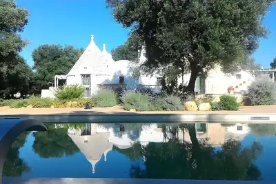 Image de Villa « I Luoghi Del Sole - Trullo Entier » avec Piscine Privée, Wi-Fi et Climatisation