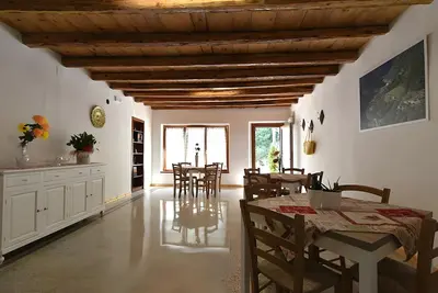 Image de Maison de vacances 'In Valle - Alloggio Vacanze Quero' avec vue sur la montagne, terrasse privée et Wi-Fi