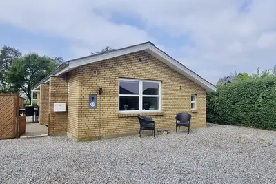 Image de Schönes Ferienhaus mit Wildnisbad und Saunatonne